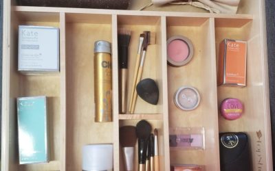 pull out shelf organized for cosmetic goods