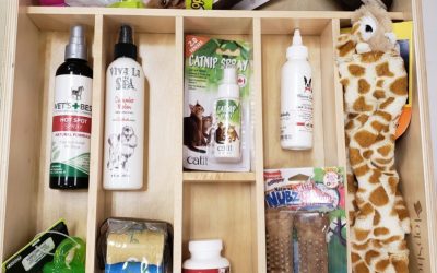 pull out shelf organized for pet care items